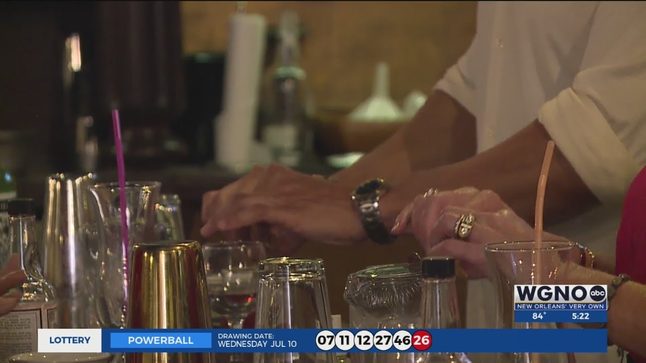 WGNO TV news segment featuring guests learning to make cocktails during a Drink Lab New Orleans mixology class.